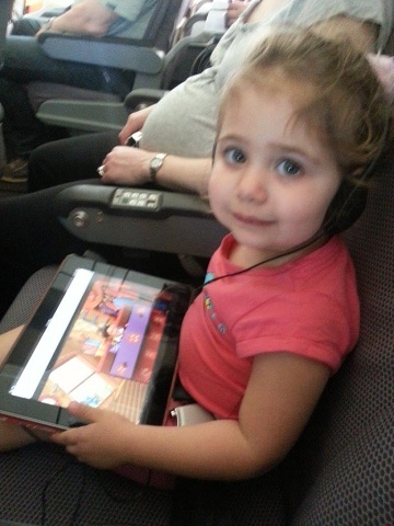 2013-10-27 Natalie Danielle Plane Ipad Pregnant Funny Face1